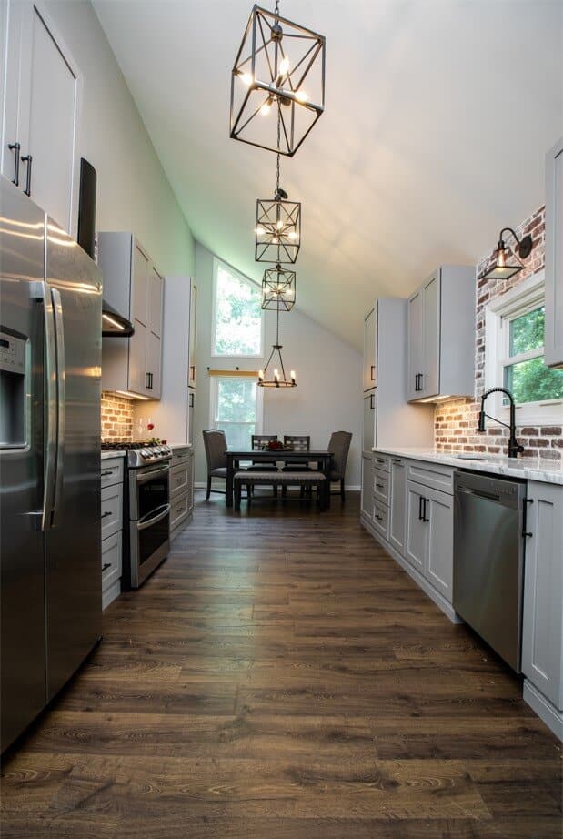 open kitchen with white cabinets