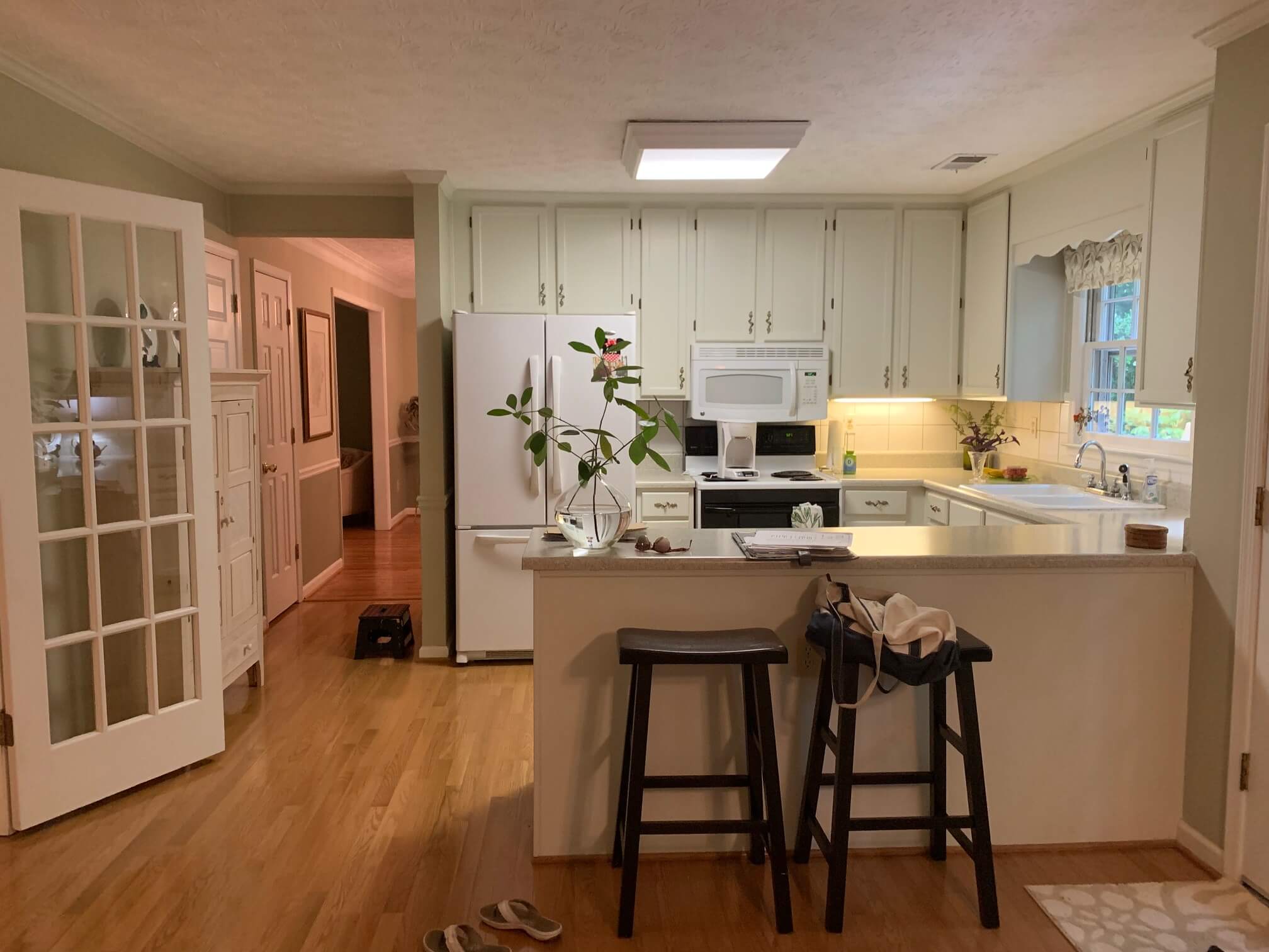 small kitchen with white cabinets 