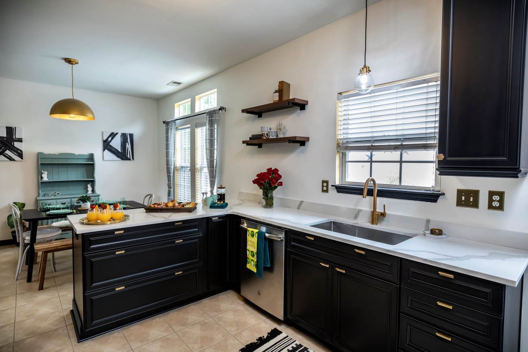 L shaped kitchen with black cabinets