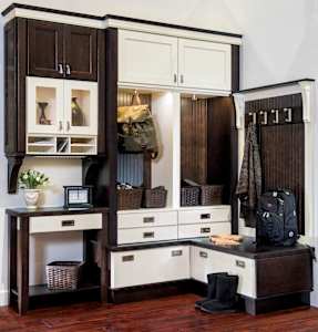 traditional white and dark brown mudroom cabinets