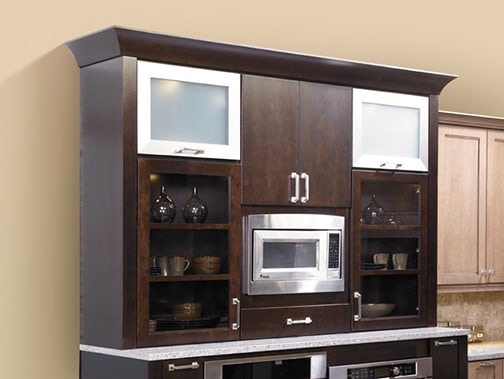 These Dark and Brown cabinets for the 2012, 2011, and 2010 Exhibit Booth home were provided by Wellborn Cabinet, Inc.