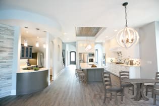 A Maple Kitchen featuring Henlow Square cabinet doors in Glacier from Wellborn Cabinet, Inc.