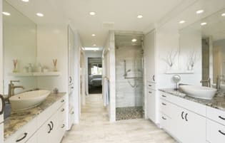 A Maple Bath featuring Milan cabinet doors in Unfinished from Wellborn Cabinet, Inc.