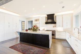 A Maple Kitchen featuring Seville Square cabinet doors in Glacier from Wellborn Cabinet, Inc.