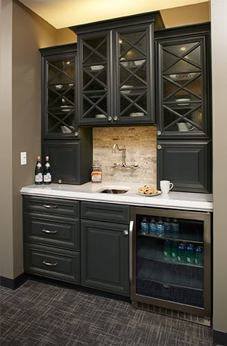 A Maple Hutch and Refreshment Areas featuring Savannah cabinet doors in Bleu Java from Wellborn Cabinet, Inc.