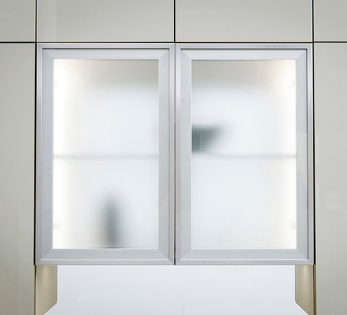 Midtown and Fresno is Decorative Laminate Veneer Door and Metal Door door group with a Slab cabinet door from Wellborn Cabinet.