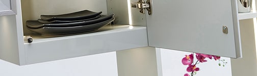 Midtown is Decorative Laminate Veneer Door door group with a Slab cabinet door from Wellborn Cabinet.