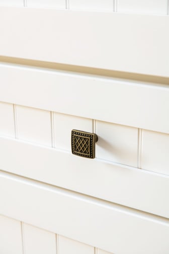 These White and Light cabinets for the 2020 Exhibit Booth home were provided by Wellborn Cabinet, Inc.