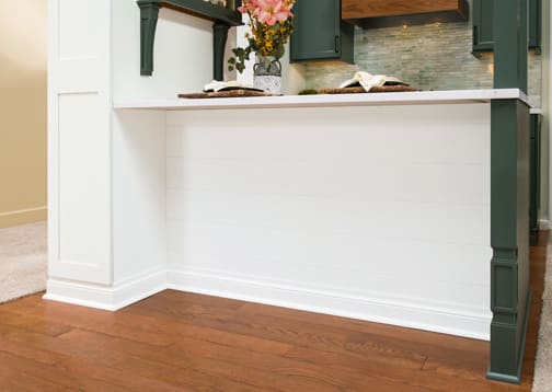 These Light and White cabinets for the 2020 Exhibit Booth home were provided by Wellborn Cabinet, Inc.