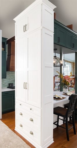 These Light and White cabinets for the 2020 Exhibit Booth home were provided by Wellborn Cabinet, Inc.