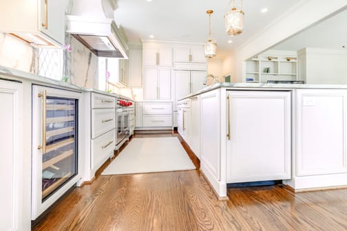 A Maple Kitchen featuring Harmony cabinet doors in Oyster White from Wellborn Cabinet, Inc.