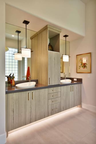 A  Bath featuring Arcadia cabinet doors in  from Wellborn Cabinet, Inc.