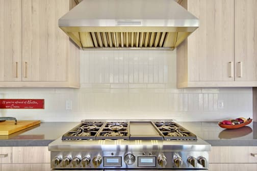 Arcadia is Decorative Laminate Veneer Door door group with a Slab cabinet door from Wellborn Cabinet.