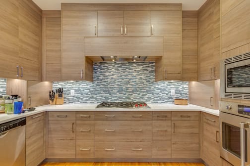 Bel-Air is Decorative Laminate Veneer Door door group with a Slab cabinet door from Wellborn Cabinet.