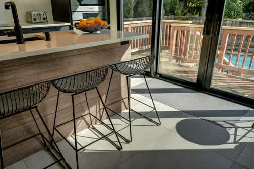 Bel-Air is Decorative Laminate Veneer Door door group with a Slab cabinet door from Wellborn Cabinet.