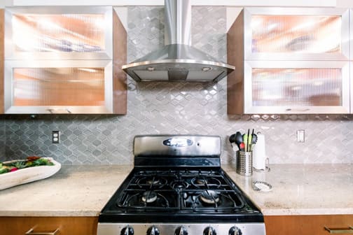 Milan and Sterling is Wood Door and Metal Door door group with a Slab cabinet door from Wellborn Cabinet.
