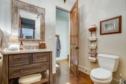 A Character Maple Bath featuring Hanover cabinet doors in Drift from Wellborn Cabinet, Inc.