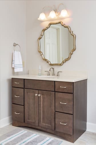 A Maple Bath featuring Millbrook Square cabinet doors in Drift from Wellborn Cabinet, Inc.