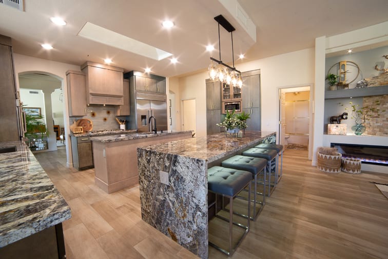 A Maple Kitchen featuring Milan cabinet doors in Drift and Oatmeal from Wellborn Cabinet, Inc.