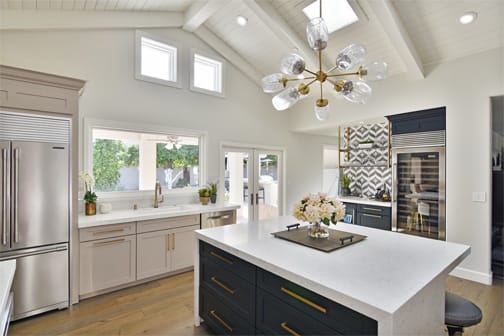 A Maple Kitchen featuring Hanover and Sandia cabinet doors in Bleu and Dove from Wellborn Cabinet, Inc.