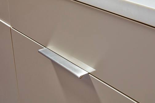 Midtown is Decorative Laminate Veneer Door door group with a Slab cabinet door from Wellborn Cabinet.