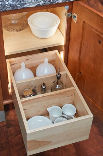 These Brown and Light cabinets for the 2021 Exhibit Booth home were provided by Wellborn Cabinet, Inc.