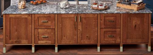 These Brown and Light cabinets for the 2021 Exhibit Booth home were provided by Wellborn Cabinet, Inc.