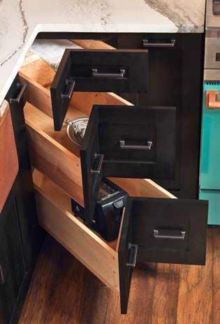 These Gray and Dark cabinets for the 2022 Exhibit Booth home were provided by Wellborn Cabinet, Inc.