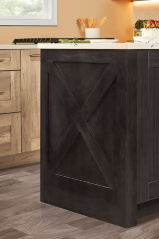These Dark cabinets for the 2022 Exhibit Booth home were provided by Wellborn Cabinet, Inc.