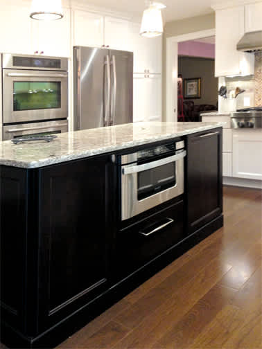 These Dark and Brown cabinets for the 2013 Design Contest and Residential Home home were provided by Wellborn Cabinet, Inc.