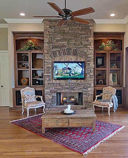 A Maple Living Room featuring Seville Square cabinet doors in Sable from Wellborn Cabinet, Inc.