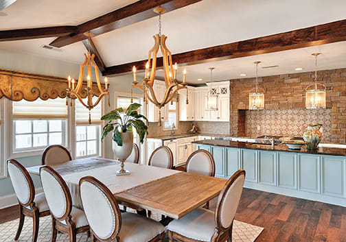 A Maple Dining Room featuring Richmond cabinet doors in Divinity Java from Wellborn Cabinet, Inc.