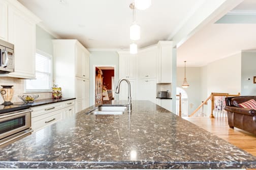 A Medium Density Fiberboard Kitchen featuring Belmont cabinet doors in Glacier from Wellborn Cabinet, Inc.