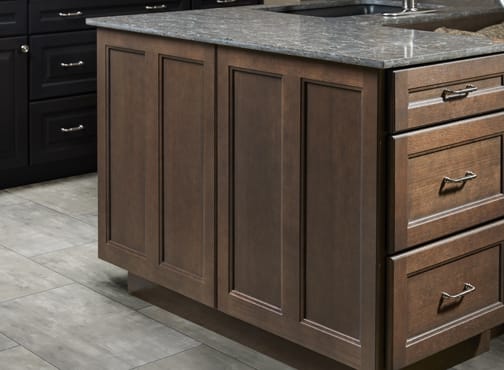 These Gray cabinets for the 2019 Exhibit Booth home were provided by Wellborn Cabinet, Inc.