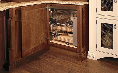 These Medium and Brown cabinets for the 2012, 2011, and 2010 Exhibit Booth home were provided by Wellborn Cabinet, Inc.