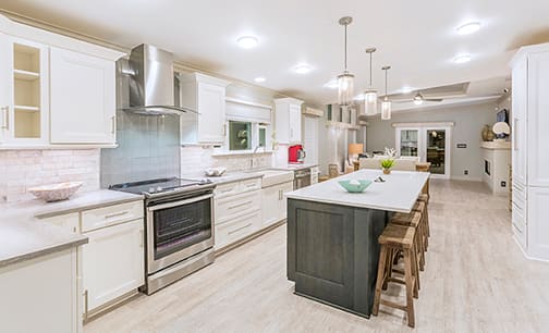 A Maple and Oak Kitchen featuring Chelsea and Winslow cabinet doors in Glacier Pewter from Wellborn Cabinet, Inc.