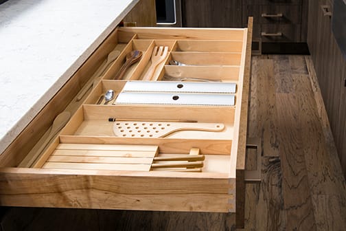 Organize your space with this Birch Cutlery Organizer, Birch Wrap Holder, and Birch Knife Block from Wellborn Cabinet