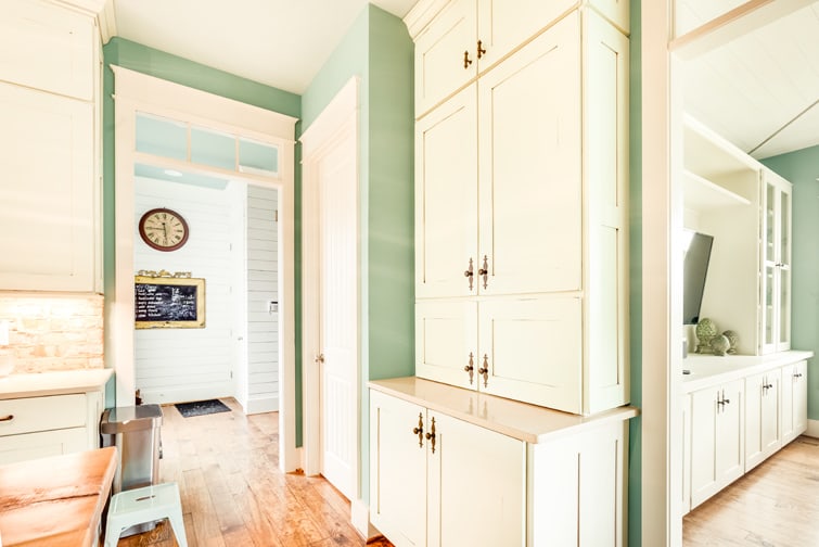 A Character Maple Hutch and Refreshment Areas featuring Hanover cabinet doors in Divinity Java from Wellborn Cabinet, Inc.