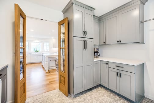 A Maple Pantry featuring Hanover cabinet doors in Dove from Wellborn Cabinet, Inc.