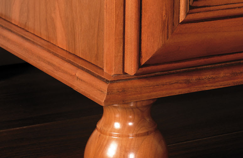 These Light and Brown cabinets for the 2010 Photo Shoot home were provided by Wellborn Cabinet, Inc.