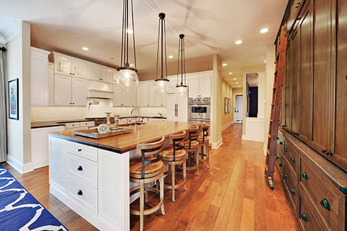 A Maple Kitchen featuring Sonoma cabinet doors in Caramel Java from Wellborn Cabinet, Inc.