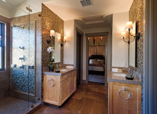 A Maple Bath featuring Henlow Square cabinet doors in Ginger from Wellborn Cabinet, Inc.