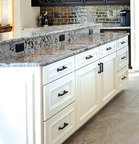 These Light and White cabinets for the 2014 Echelon and Residential Home home were provided by Wellborn Cabinet, Inc.