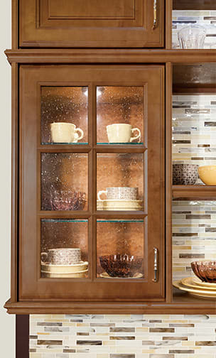 These Brown and Medium cabinets for the 2013 Exhibit Booth home were provided by Wellborn Cabinet, Inc.