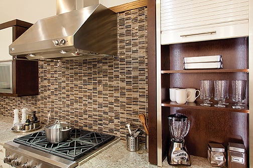 These Brown and Dark cabinets for the 2014 and 2013 Exhibit Booth home were provided by Wellborn Cabinet, Inc.