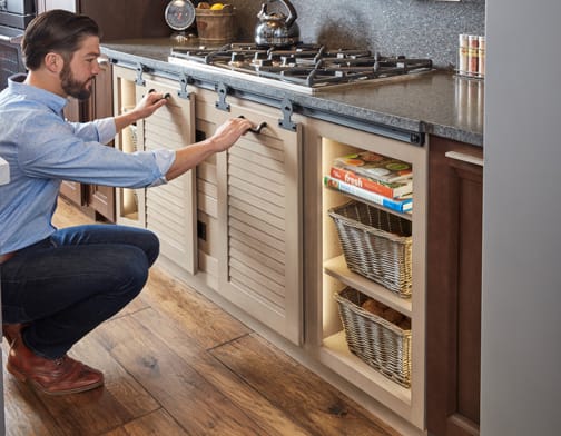 These Brown and Light cabinets for the 2020 and 2019 Exhibit Booth home were provided by Wellborn Cabinet, Inc.