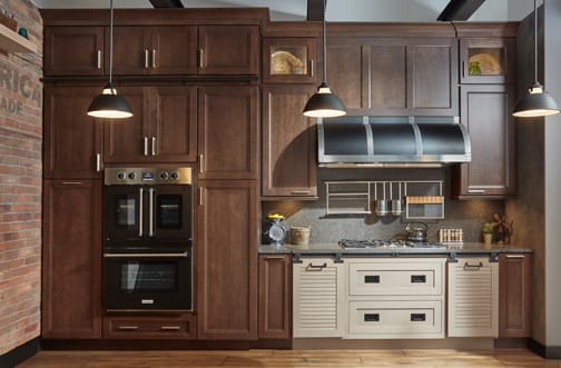 A Maple Kitchen featuring Hanover Inset, Antigua, and Chelsea cabinet doors in Suede and Shale from Wellborn Cabinet, Inc.