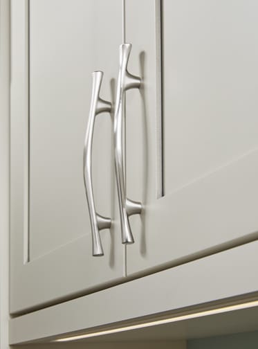 These Light and Beige cabinets for the 2020 and 2019 Exhibit Booth home were provided by Wellborn Cabinet, Inc.