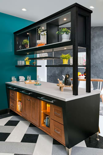 A Maple and Oak Hutch and Refreshment Areas featuring Vienna and Barcelona cabinet doors in Hazelnut and Onyx from Wellborn Cabinet, Inc.