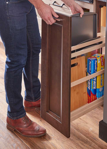 These Brown and Dark cabinets for the 2020 and 2019 Exhibit Booth home were provided by Wellborn Cabinet, Inc.